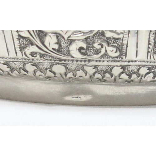 1070 - A highly decorative Anglo-Indian or Burmese silver bowl with embossed decoration, unmarked but XRF t... 