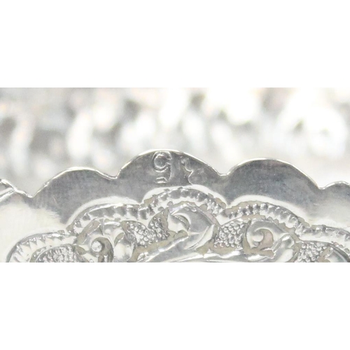 1070 - A highly decorative Anglo-Indian or Burmese silver bowl with embossed decoration, unmarked but XRF t... 