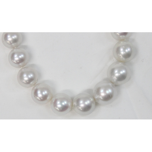 1141 - An impressive Wai Kee cultured pearl and 18ct white gold necklace, consisting of 31 graduated cultur... 