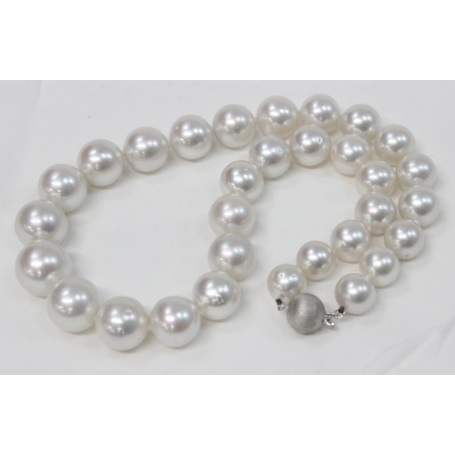 1141 - An impressive Wai Kee cultured pearl and 18ct white gold necklace, consisting of 31 graduated cultur... 