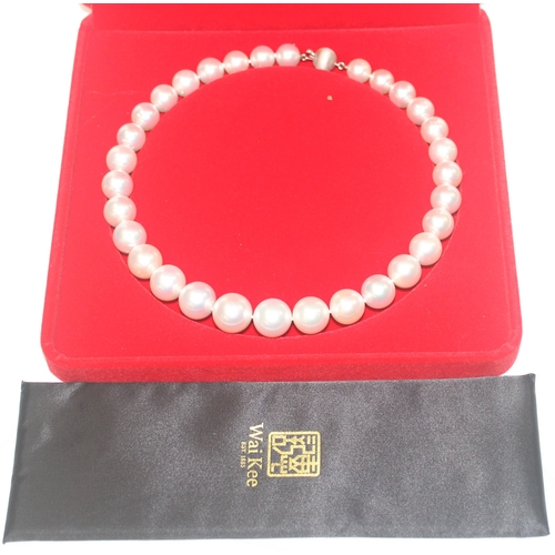 1141 - An impressive Wai Kee cultured pearl and 18ct white gold necklace, consisting of 31 graduated cultur... 