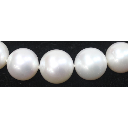 1141 - An impressive Wai Kee cultured pearl and 18ct white gold necklace, consisting of 31 graduated cultur... 