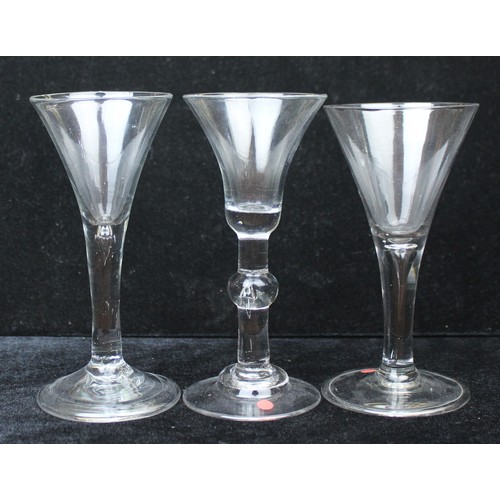 1608 - 3 Georgian period wine glasses, all with drawn bowls and plain stems with teardrops one of which ver... 