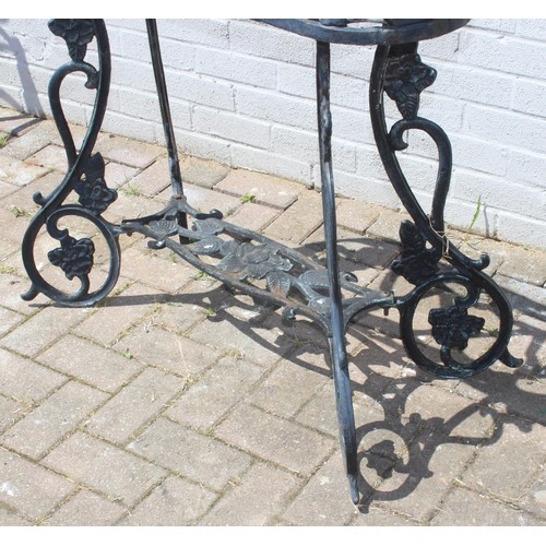 364 - Cast iron planter stand with floral designs approx 88cm W x 27cm D x 80cm H