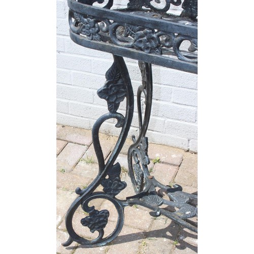 364 - Cast iron planter stand with floral designs approx 88cm W x 27cm D x 80cm H