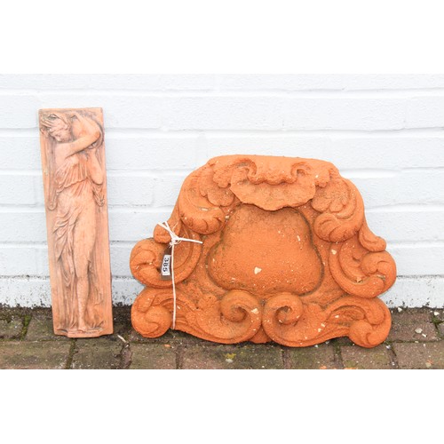 385 - Qty of terracotta and stone garden items to include a terracotta wall finial approx 50cm W x 36cm H