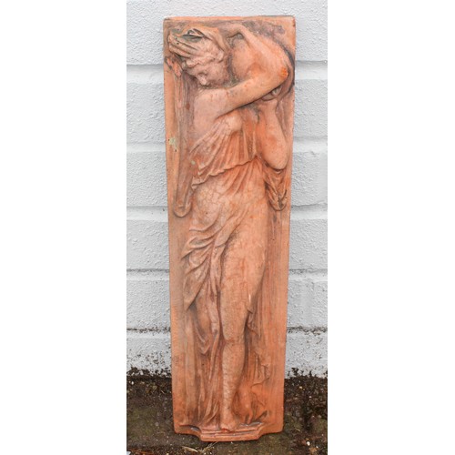 385 - Qty of terracotta and stone garden items to include a terracotta wall finial approx 50cm W x 36cm H