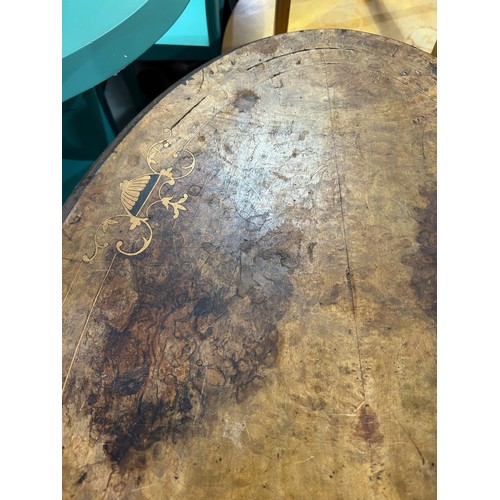 80 - A Victorian oval topped walnut table with decorative pillar base, approx 92cm wide x 57cm deep x 69c... 