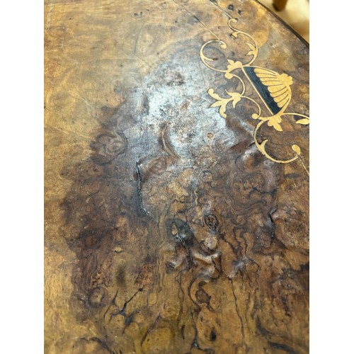 80 - A Victorian oval topped walnut table with decorative pillar base, approx 92cm wide x 57cm deep x 69c... 