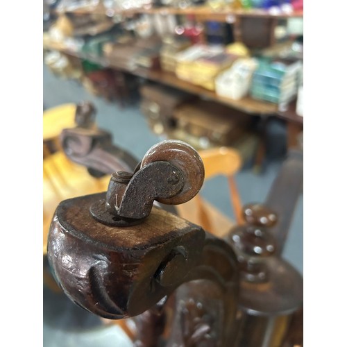 80 - A Victorian oval topped walnut table with decorative pillar base, approx 92cm wide x 57cm deep x 69c... 