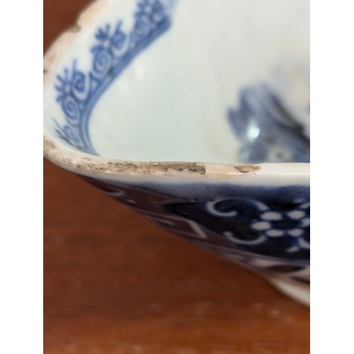 1765 - An antique Chinese blue and white gravy boat of ribbed form, likely 19th century, approx 20cm long