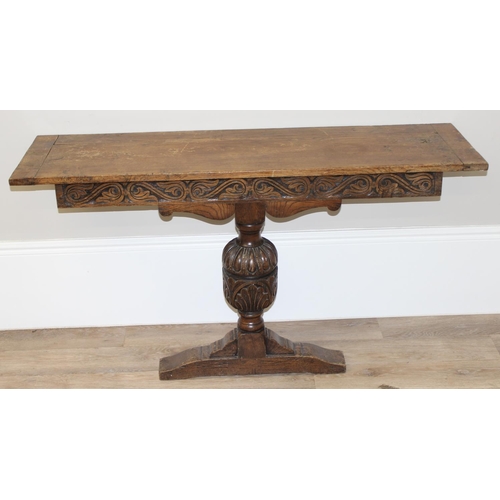 179 - Vintage heavily carved oak wall mounted console table with pedestal base, approx 137 x 41 x 74cm