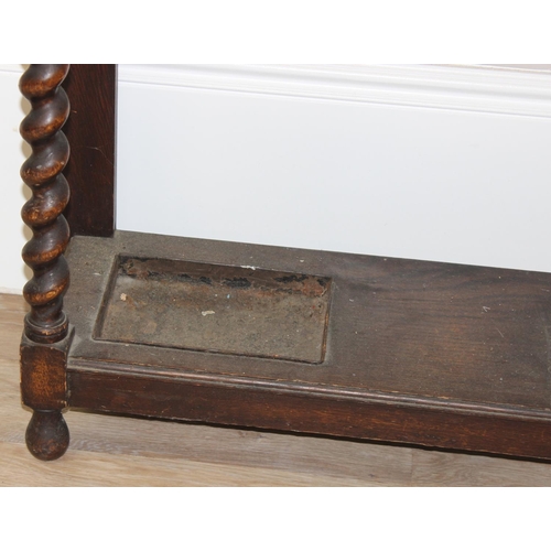 59 - Early 20th century oak hall stand with carved details, barley twist supports and bevelled-edge mirro... 