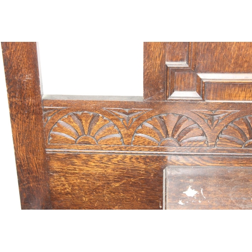 59 - Early 20th century oak hall stand with carved details, barley twist supports and bevelled-edge mirro... 