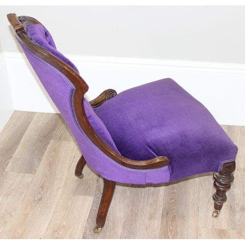 180 - Antique mahogany framed nursing chair with button-backed purple upholstery and carved details, appro... 