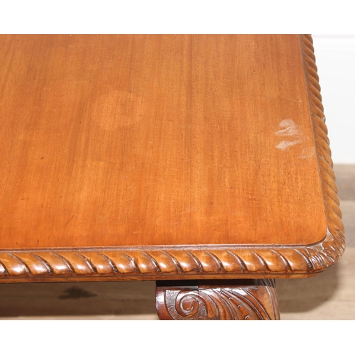 4 - Highly polished mahogany extending dining table with rope edged details and carved legs with ball an... 