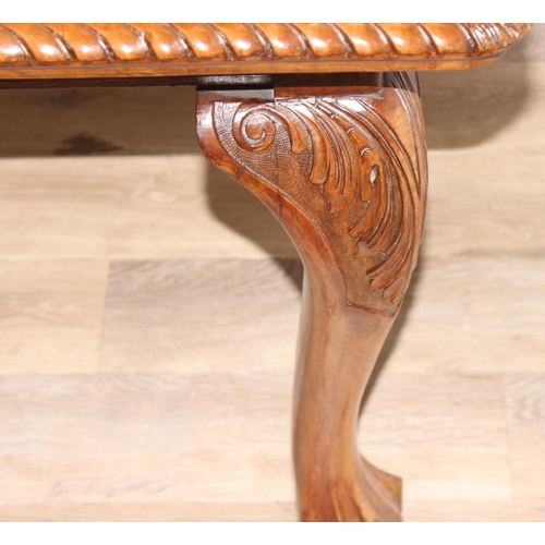 4 - Highly polished mahogany extending dining table with rope edged details and carved legs with ball an... 