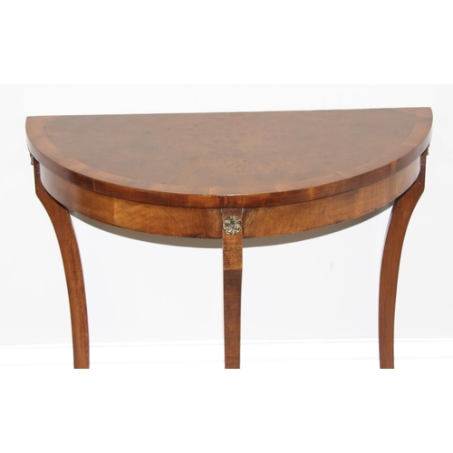 15 - Edwardian mahogany demi-lune table of small proportions with thin shaped legs, approx 59 x 30 x 77cm