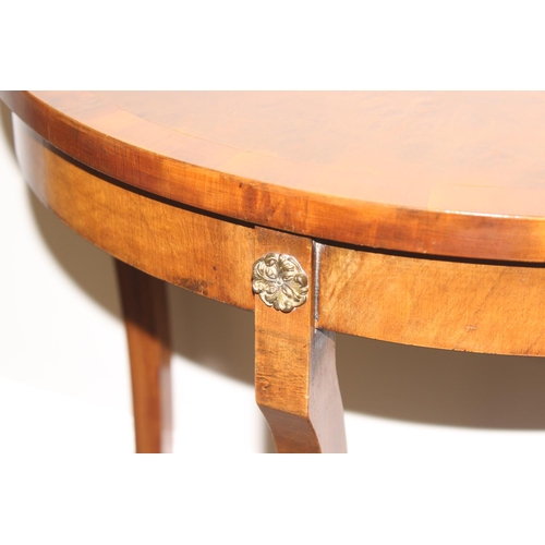 15 - Edwardian mahogany demi-lune table of small proportions with thin shaped legs, approx 59 x 30 x 77cm