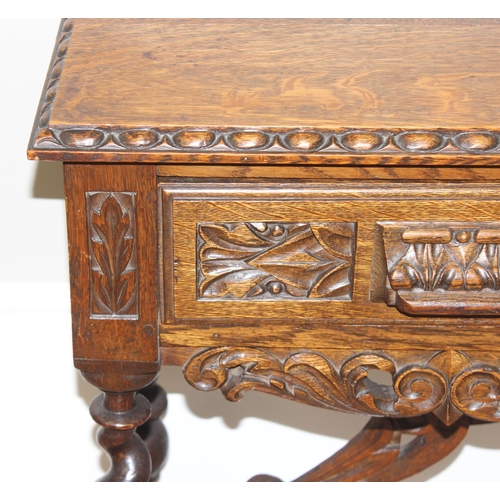 1 - Jacobean style carved oak hall table with barley-twist legs and 2 drawers, approx 110 x 46 x 77cm