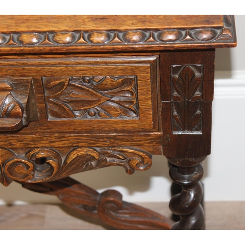 1 - Jacobean style carved oak hall table with barley-twist legs and 2 drawers, approx 110 x 46 x 77cm