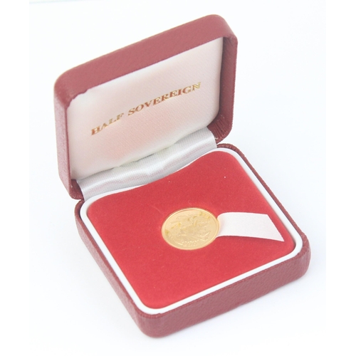 1203 - Gold Coins - Half Sovereign - 2005 Queen Elizabeth II uncirculated coin, with red box, unusual desig... 