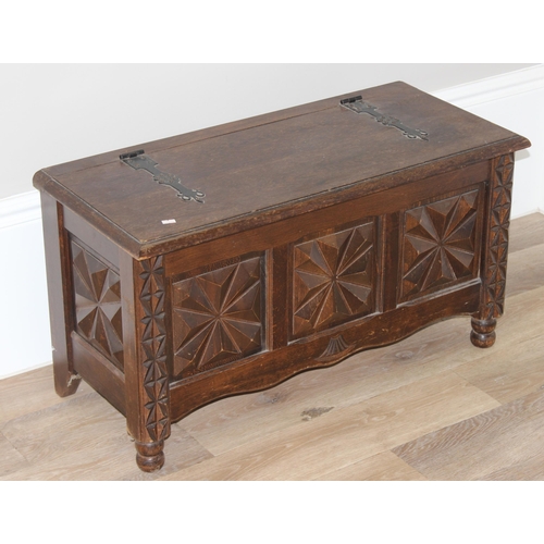 6 - A vintage oak trunk or coffer with unusual carved geometric design, approx 83cm wide x 37cm deep x 4... 