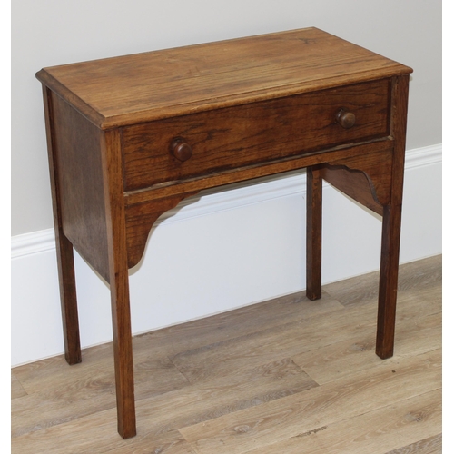 149 - An early 20th century oak console table with single drawer, approx 78cm wide x 42cm deep x 79cm tall