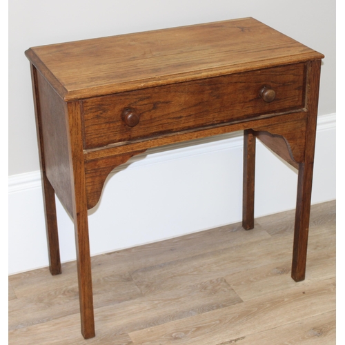 149 - An early 20th century oak console table with single drawer, approx 78cm wide x 42cm deep x 79cm tall