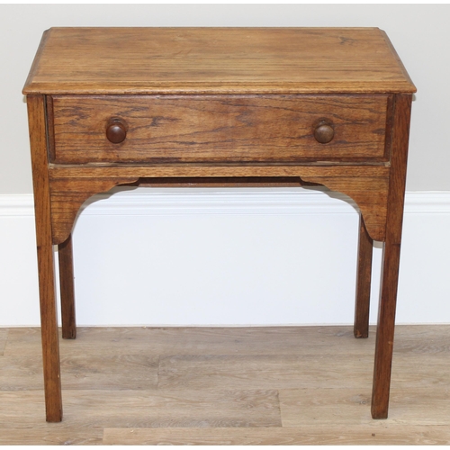 149 - An early 20th century oak console table with single drawer, approx 78cm wide x 42cm deep x 79cm tall