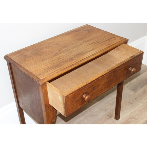 149 - An early 20th century oak console table with single drawer, approx 78cm wide x 42cm deep x 79cm tall