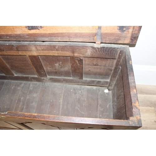 142 - An 18th century oak mule chest with 2 drawers to base, brass fittings, approx 148cm wide x 53cm deep... 