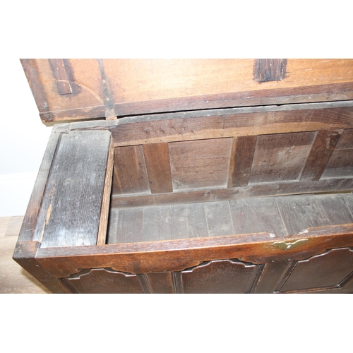 142 - An 18th century oak mule chest with 2 drawers to base, brass fittings, approx 148cm wide x 53cm deep... 