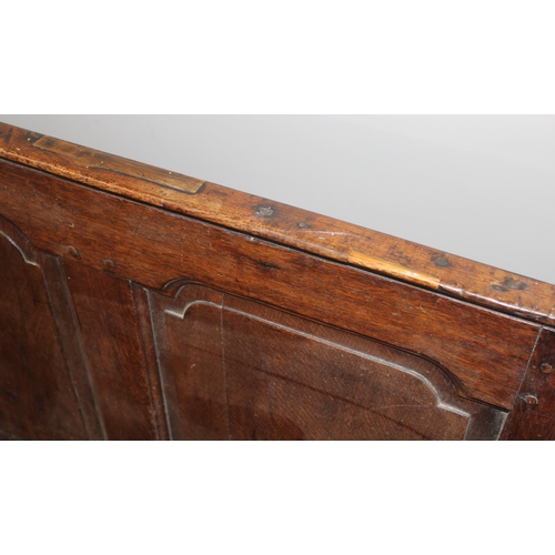 31 - A long antique oak high backed bench or settle with cushion seat, approx 182cm wide x 60cm deep x 10... 