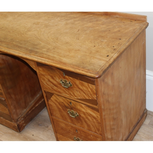 55 - An unusual antique satinwood kneehole desk with veneered wooden details, approx 122cm wide x 59cm de... 