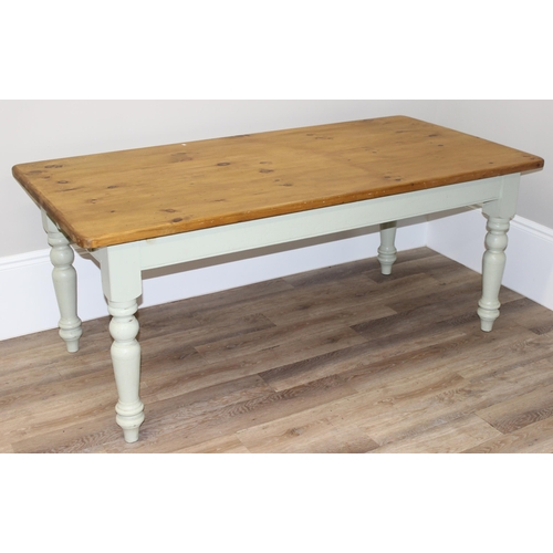 38 - A vintage pine kitchen table with painted base, approx 182cm wide x 91cm deep x 76cm tall