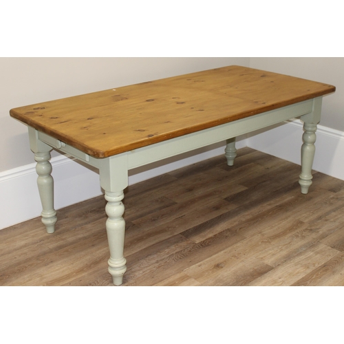 38 - A vintage pine kitchen table with painted base, approx 182cm wide x 91cm deep x 76cm tall