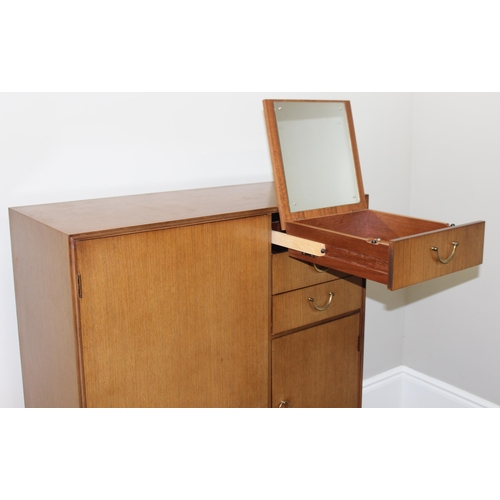 65 - A retro Meredew gentleman's wardrobe with 3 short drawers, one containing a fold out mirror, approx ... 