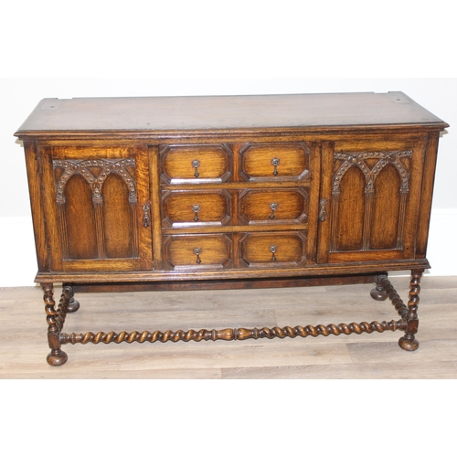 151 - A 17th century style carved oak sideboard with barleytwist supports, approx 152cm wide x 51cm deep x... 