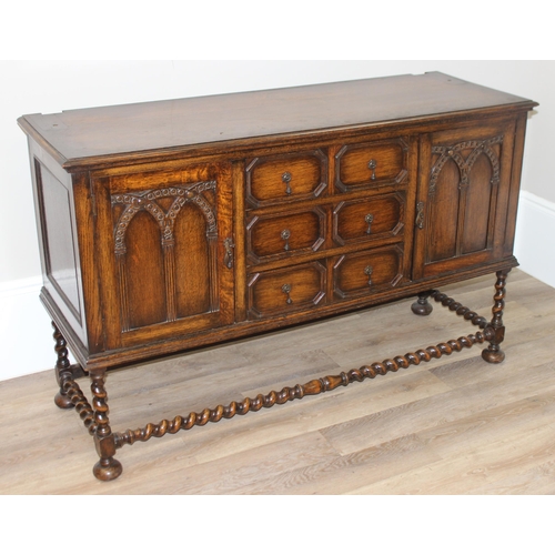 151 - A 17th century style carved oak sideboard with barleytwist supports, approx 152cm wide x 51cm deep x... 