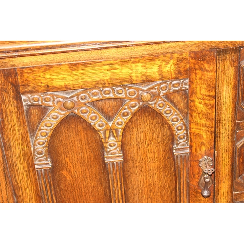 151 - A 17th century style carved oak sideboard with barleytwist supports, approx 152cm wide x 51cm deep x... 