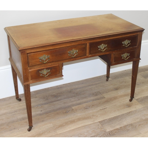 140 - A vintage mahogany desk with 4 drawers, approx 115cm wide x 55cm deep x 78cm tall