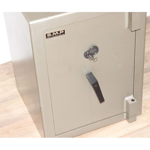 184 - Safe manufactured by SMP of Telford, with key, approx 46cm wide x 46cm deep x 60cm tall