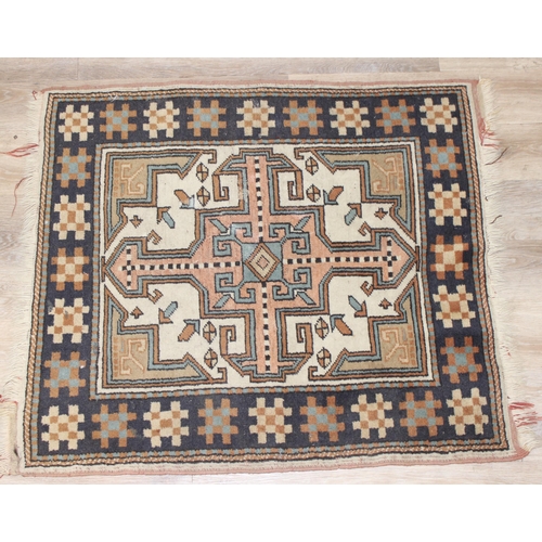 201 - A vintage Oushak style rug with geometric patterns, possibly Turkish in origin, approx 105cm x 95cm