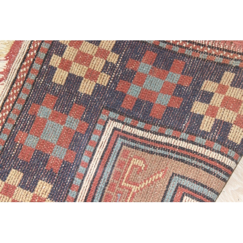 201 - A vintage Oushak style rug with geometric patterns, possibly Turkish in origin, approx 105cm x 95cm