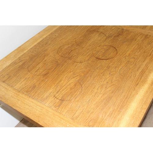 35 - A very heavy light oak dining table with X frame base, approx 180cm wide x 90cm deep x 75cm tall