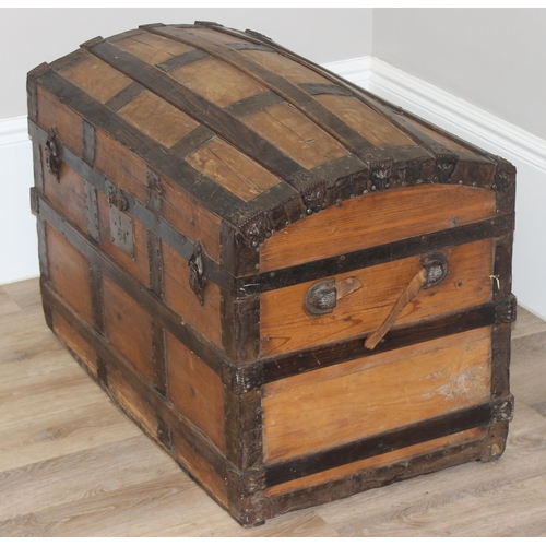 127 - An antique pine and iron-bound dome-top trunk or chest, approx 87cm wide x 51cm deep x 62cm tall