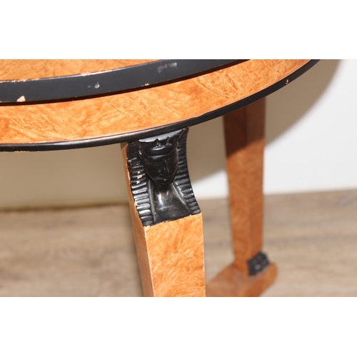 16 - An Art Deco style Egyptian Revival cherry wood and ebonised tripod gueridon table, approx 60cm wide ... 