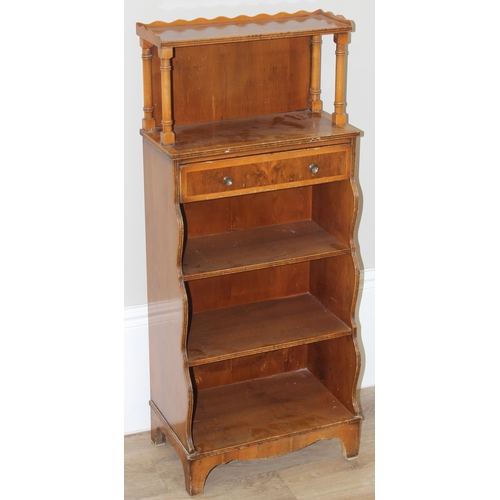 139 - An antique style yew finished waterfall bookcase with pie crust edged top, approx 46cm wide x 28cm d... 