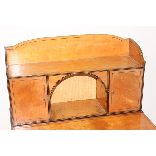 133 - An Edwardian satinwood lady's desk or Bonheur Du Jour with single drawer and fold out writing slide,... 